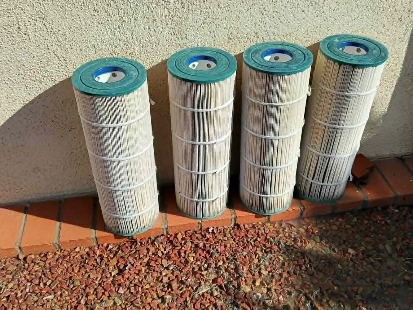 Clean cartridge pool filters after cleaning